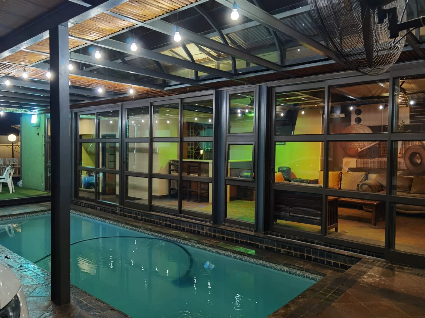 Crystal House pool and lounge at night